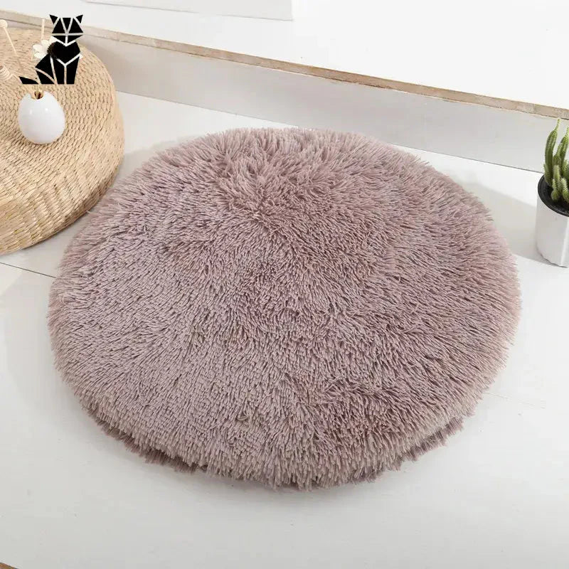 Lit rond pour petits animaux avec tapis moelleux rose