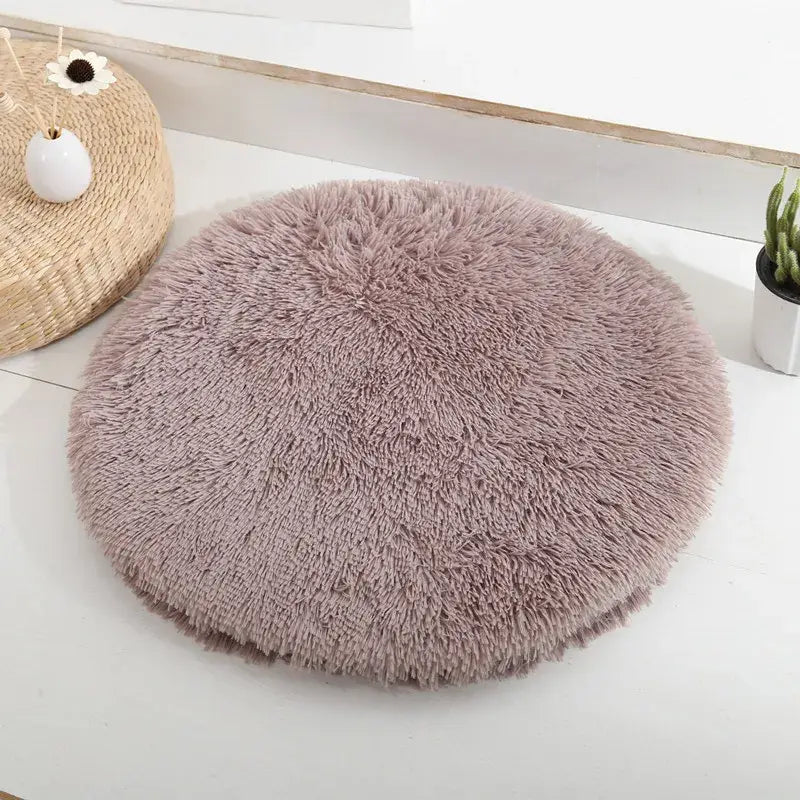Lit rond pour petits animaux avec tapis moelleux rose