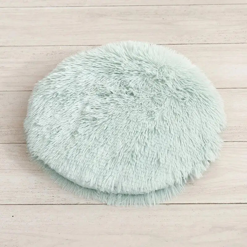 Lit rond bleu pelucheux pour chats et petits chiens